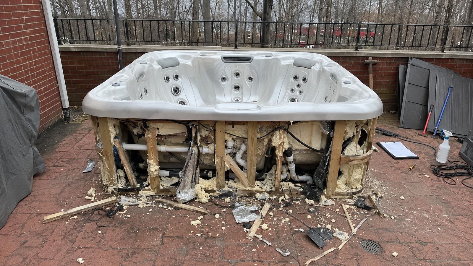 Hot tub partially cut apart during a removal job